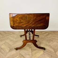 Pamono Antique English Mahogany Drop-Leaf Stretcher Table on Castors, 19th Century Discount