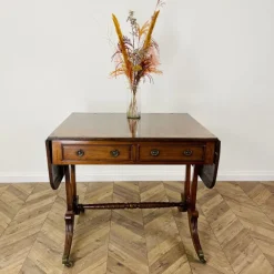 Pamono Antique English Mahogany Drop-Leaf Stretcher Table on Castors, 19th Century Discount