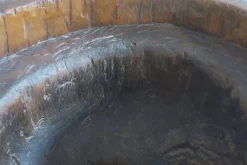 Pamono Antique Hand-Carved Mortar Coffee Table with Circular Glass Top Outlet