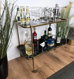 Pamono Art Deco Italian Two-Tier Gilt Brass and Marble Glass Bar Cart by Milo Baughman, 1950s New