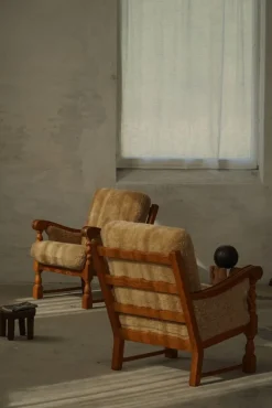 Pamono Danish Modern Lounge Chairs in Oak and Shearling Lambswool by Henning Kjærnulf, 1960s, Set of 2 Outlet