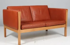 Pamono Danish Two-Seat Sofa in Leather and Oak by Hans J. Wegner, 1960s Clearance