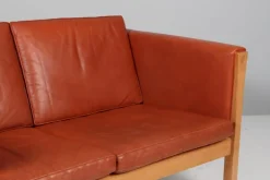 Pamono Danish Two-Seat Sofa in Leather and Oak by Hans J. Wegner, 1960s Clearance