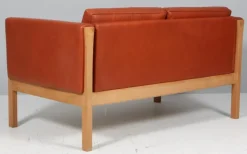 Pamono Danish Two-Seat Sofa in Leather and Oak by Hans J. Wegner, 1960s Clearance