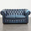 Pamono Fantastic 2-Seater Leather Chesterfield Sofa with a Denim Blue Colour.