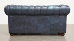 Pamono Fantastic 2-Seater Leather Chesterfield Sofa with a Denim Blue Colour.