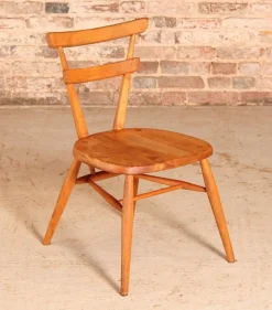 Pamono Mid-Century Blue Dot Children's Chair from Ercol, 1960s Outlet