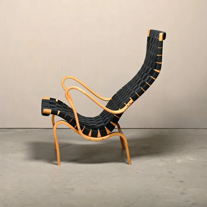 Pamono Set of Pernilla Easy Chair and Ottoman in Beech and Black Upholstery by Bruno Mathsson for Dux, 1970s Clearance