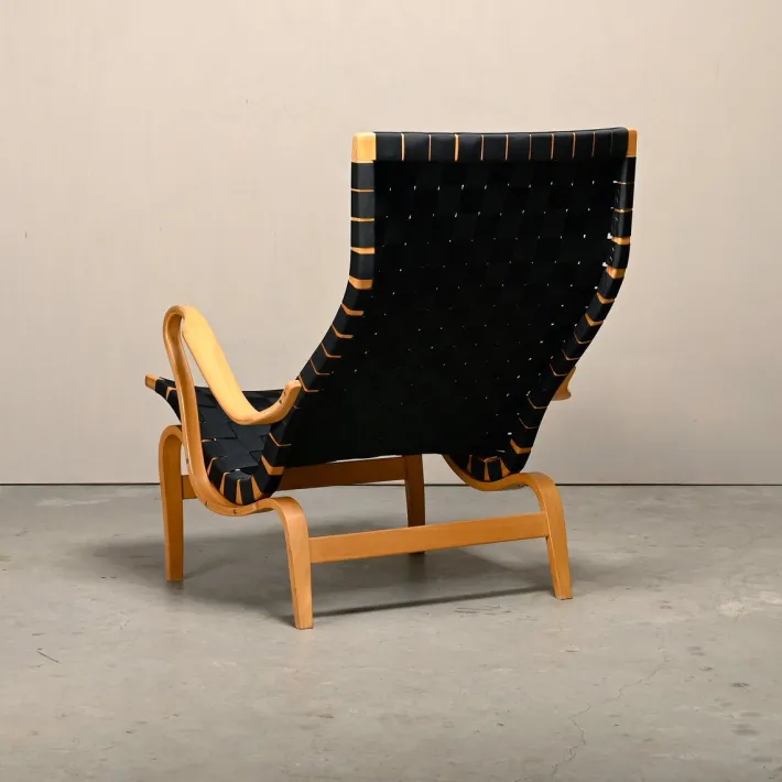 Pamono Set of Pernilla Easy Chair and Ottoman in Beech and Black Upholstery by Bruno Mathsson for Dux, 1970s Clearance