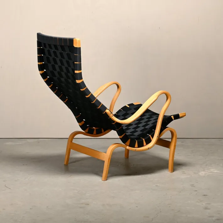 Pamono Set of Pernilla Easy Chair and Ottoman in Beech and Black Upholstery by Bruno Mathsson for Dux, 1970s Clearance