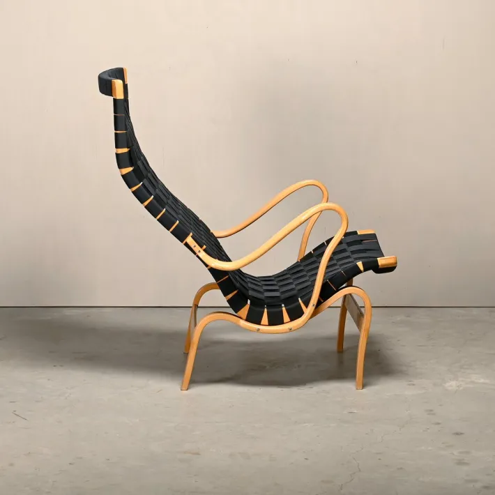 Pamono Set of Pernilla Easy Chair and Ottoman in Beech and Black Upholstery by Bruno Mathsson for Dux, 1970s Clearance