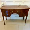 Pamono Small Antique George III Figured Mahogany Bow Front Sideboard, 1800s Online