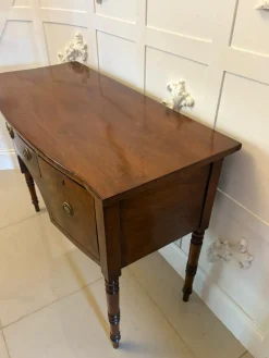 Pamono Small Antique George III Figured Mahogany Bow Front Sideboard, 1800s Online