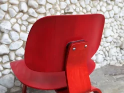 Pamono Stained Red LCW Lounge Chair by Charles & Ray Eames for Herman Miller / Evans Products Company, 1948 Hot