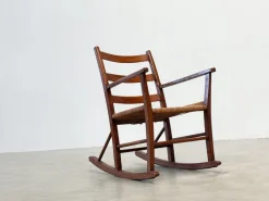 Pamono Wooden Rocking Chair by Aksel Hansson, 1950s Sale